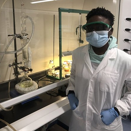 Timilehin Oluwole ’24, ’25 M.S. in the laboratory.