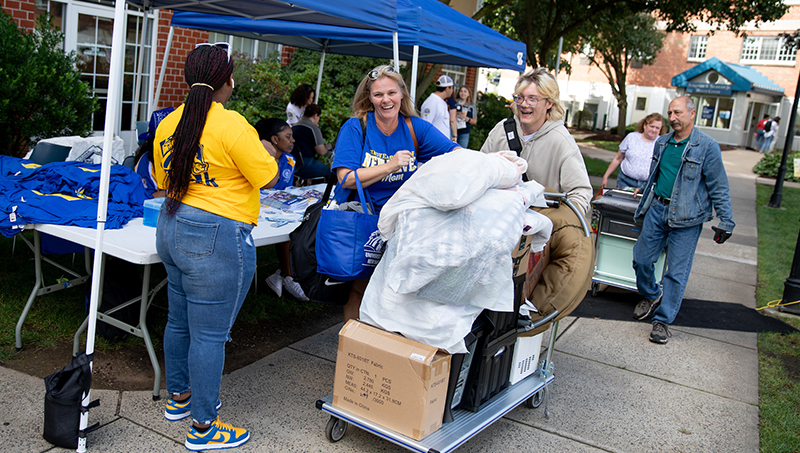 Families helped new students move into the residence halls.