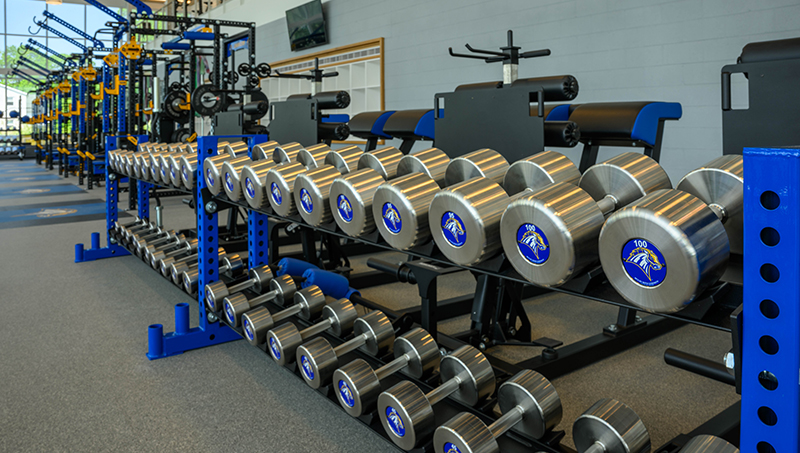 Charger pride is reflected throughout the PPC – including on the dumbbells.