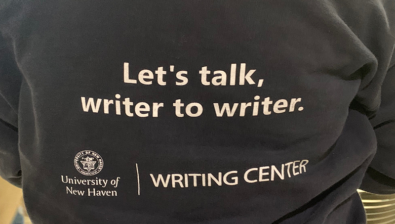 Writing Center's custom sweatshirt.