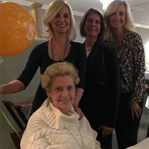 Image of Kathy and her sisters celebrate their mother’s 85th birthday.