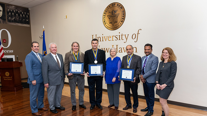 University leaders recognized Kevin Barnes-Ceeney, Ph.D., Adrian Rusu, Ph.D., and Tirthankar Ghosh, Ph.D.