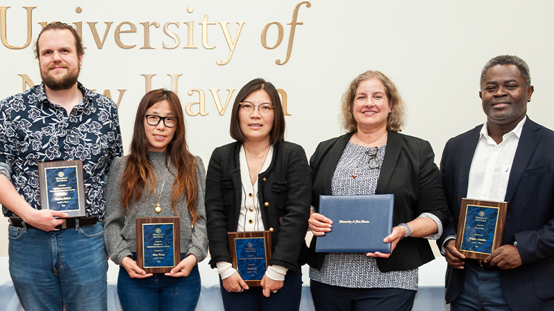 Representing TCoE were: Nathan Seifert (far left), Shue Wang (center), and to Wang's right (in order) Huan Gu, Liberty Page, and Kagya Amoako.