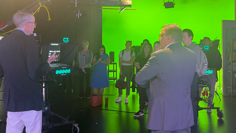 University of New Haven faculty and staff, including Bruce Barber (left) and Paul Falcone (right) show off the University’s television studio