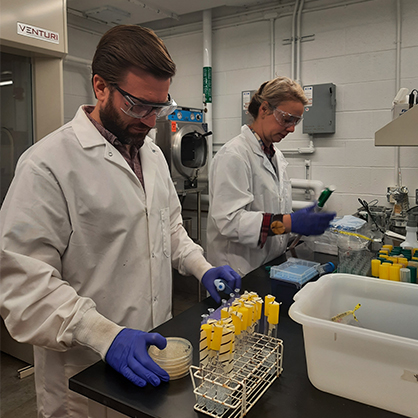 Dr. Stasulli and Anne Gilewski ’23 M.S. processing samples in the lab. 