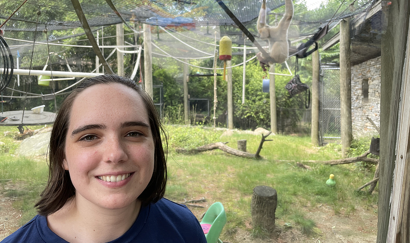 Gabrielle Hartley ’17 with the gibbons at the Roger Williams Zoo.