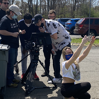 Thomas Chung ’22 (center, wearing hat) on the set of In Loving Memory.