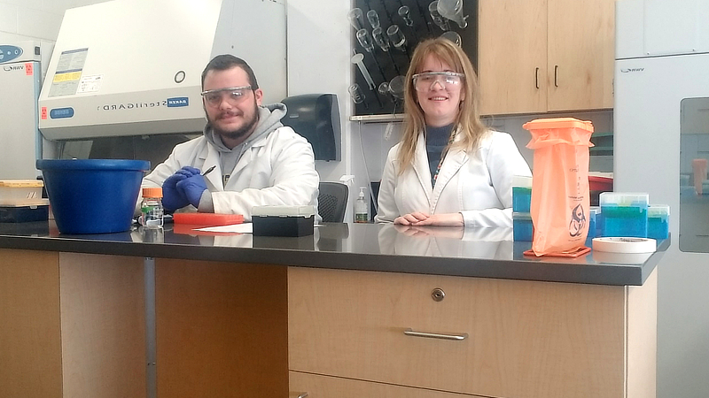 Brendan Straut and Dr. Anna Kloc in the lab