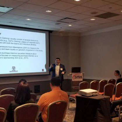 Bo Yu, Ph.D., presenting at the Sport Marketing Association Annual Conference.