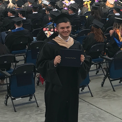 Eddie Whitman ’21 M.S. at Commencement.