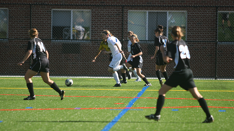 Selina Moylan O’Toole ’10, ’14 M.S. dribbles down the pitch.