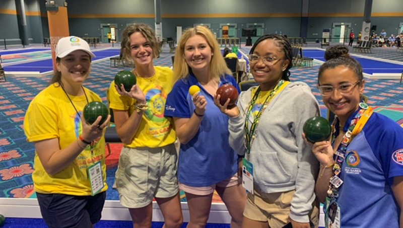 Several Pompea College of Business students volunteered at the bocce event at the Special Olympics USA Games.