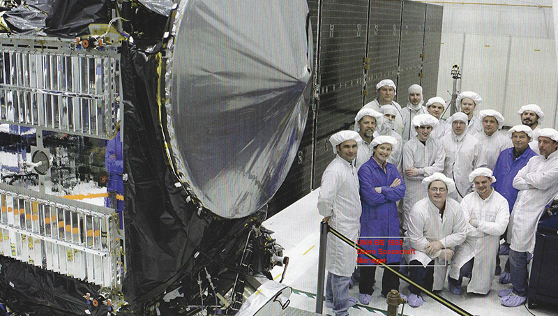 Ann Cox ’83 (left, in blue) with members of the Dawn spacecraft team.