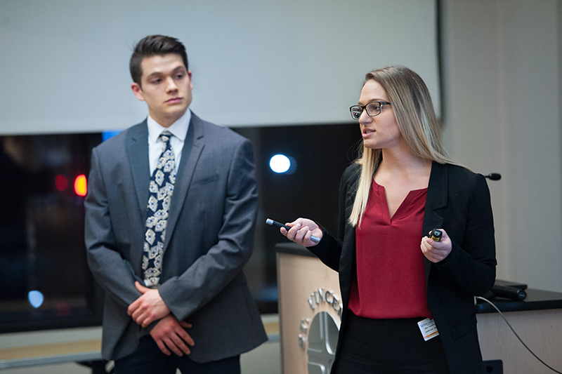 Two students presenting.