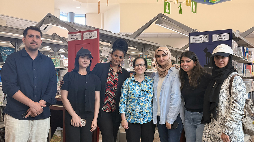 Faculty and staff in library