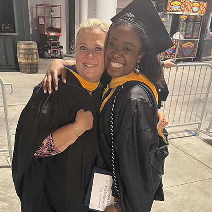 Kenny Jean-Bart ’22 M.S. (right) with Prof. Lisa Dadio.