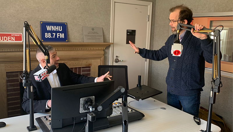 Jeffrey Treistman, Ph.D. (left), and Matthew Schmidt, Ph.D., at WNHU, the University’s radio station.