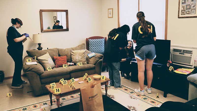 At the University’s CSI house, students investigated mock crime scenes