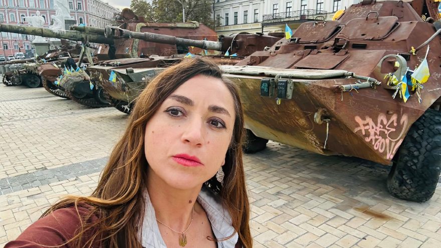 Dr. Olena Lennon at St. Michael's Square in Kyiv, featuring a display of destroyed Russian military equipment, September 2025. Photo credit: Olena Lennon