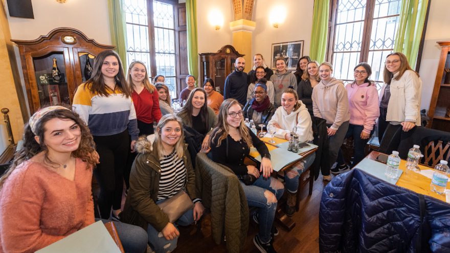 The students and the family ready for dinner.