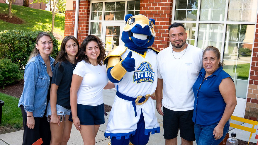 Charlie the Charger welcoming students
