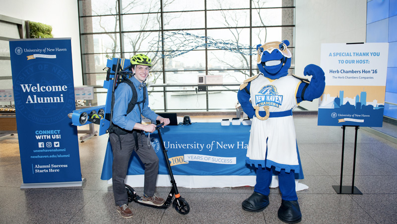 Photo of Matthew Sheehy ’19 and Charlie the Charger.