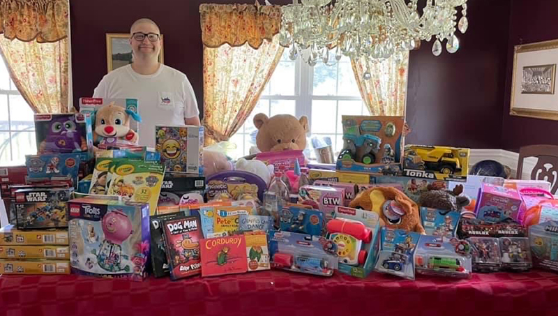 Chris Farrell ’16, ’23 MPA at a toy drive.