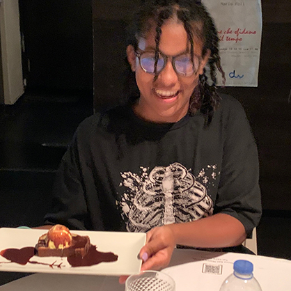 Fransheli Ventura ’23 shows off her dessert at Mokha.