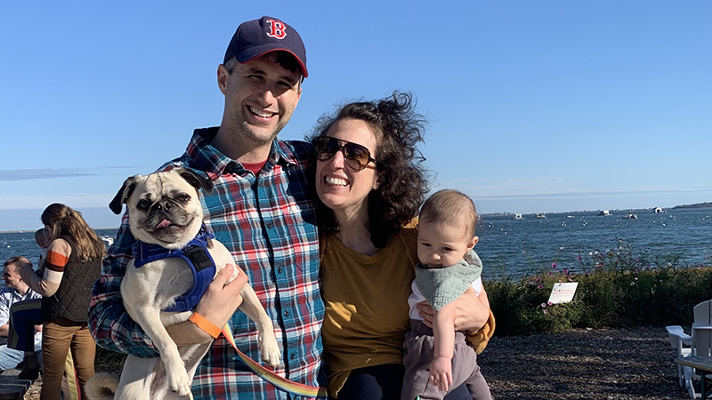 Jeff Hunt, his wife Leah, their son Artie, and dog Linus at the beach.