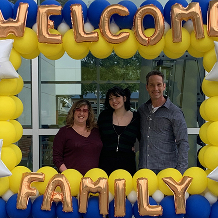 Ashley Pickow '26 and her parents at Family Day.