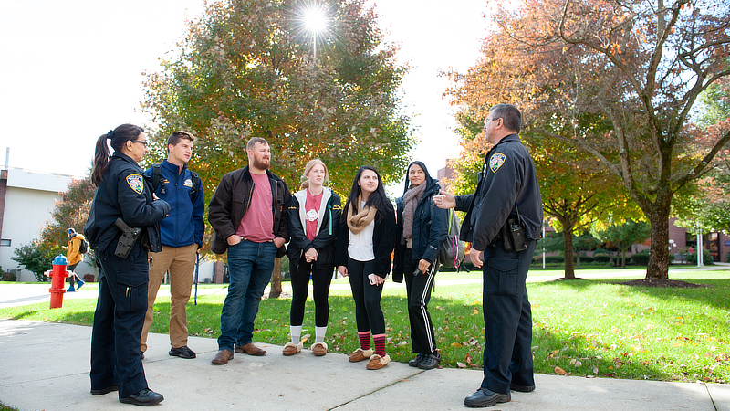 University police officers with students