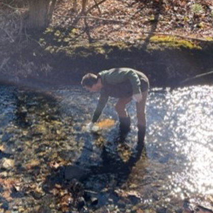 Ryan Bell ’23 collecting samples for research.