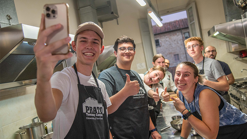 Noah Iott ’25 takes a selfie during the cooking lesson. 