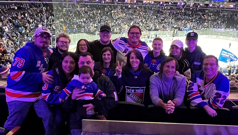 Diane Polo and her family at a Rangers vs. Capitals game at Madison Square Garden.