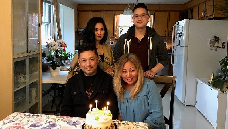 Colby Thammavongsa celebrates his mother and father’s birthday this past year.