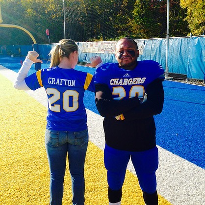 Vail and Brooke Grafton in Chargers football jerseys