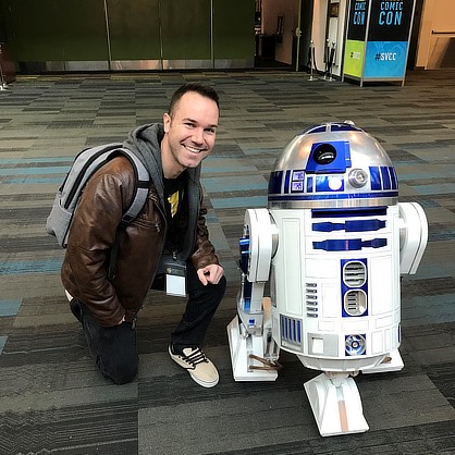 David Pendelton with R2D2 at comic con. 