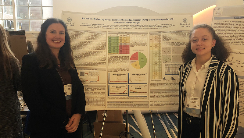 Savannah Brown ’22 M.S. and Gabrielle Messe ’22 M.S. presenting their research.