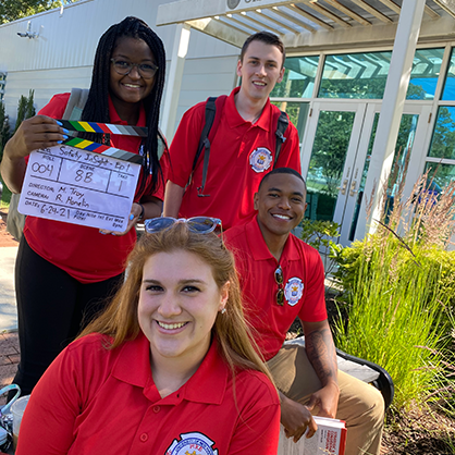 Group image of Sierra Hawkins (back), Patrick Ethier (back), Matthew Brown, and Mckenzee Juratovic at the shoot on campus.