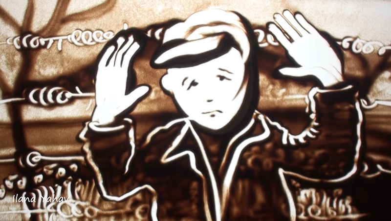 A still image of a boy with his hands raised from the sand art video by Ilana Yahav. (credit: Holocaust Memorial for the Jewish Federation of Philadelphia Sand Art by Ilana Yahav)