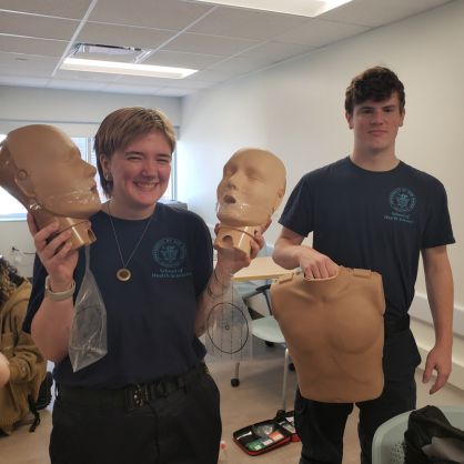 Paramedicine students have some fun while doing their CPR training. 