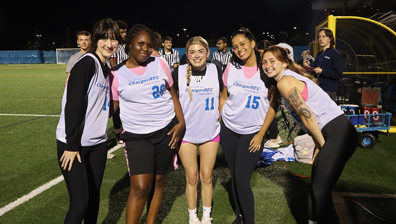 Brooke Cuthbertson ’24 and her fellow Chargers at an intramural flag football game on campus. 