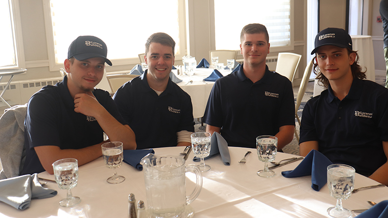 Students at the dinner reception that followed the golf outing.
