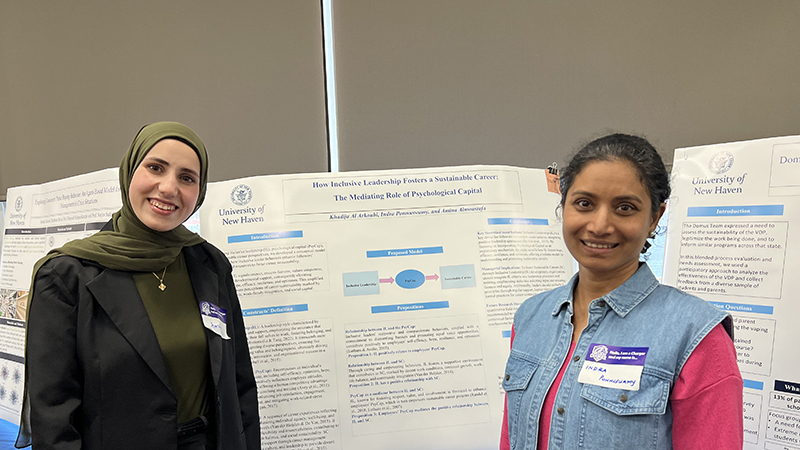 Amina Almoustafa ’24 M.S. (left) and Indra Ponnuswamy ’24 M.S. presented their research to the Charger community.