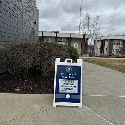 Signs directed Chargers to the U.S. Secret Service information sessions on campus. 