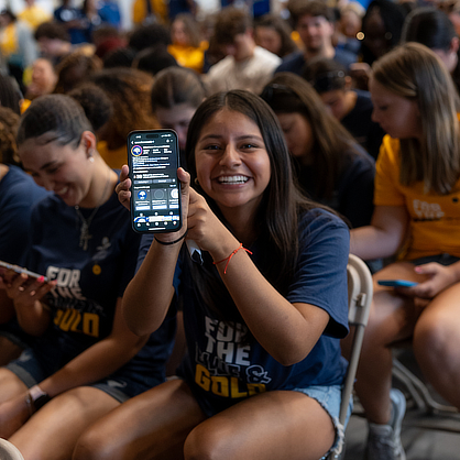 Student using Instagram on phone