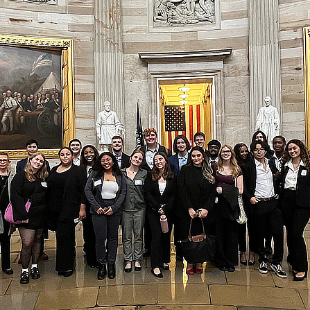 Model UN students pose in the U.S. Capitol