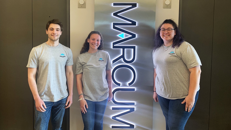 Left to right: Alex Oppliger ’23, Charlotte Bassett ’25, and Giselle Rau ’24 at Marcum.