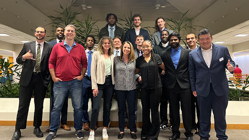 The sport management class poses for a photo.