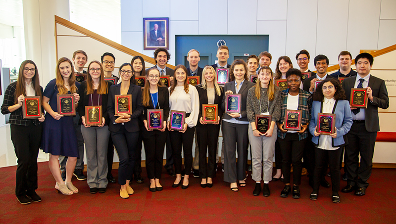 Timilehin Oluwole ’24, ’25 M.S. (front, second from right) and her fellow honorees at the symposium in North Carolina.